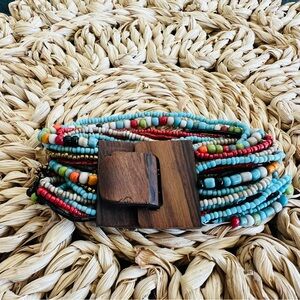 Multi Strand Glass Bead Handmade Bracelet with Monkey Pod Wooden Clasp
